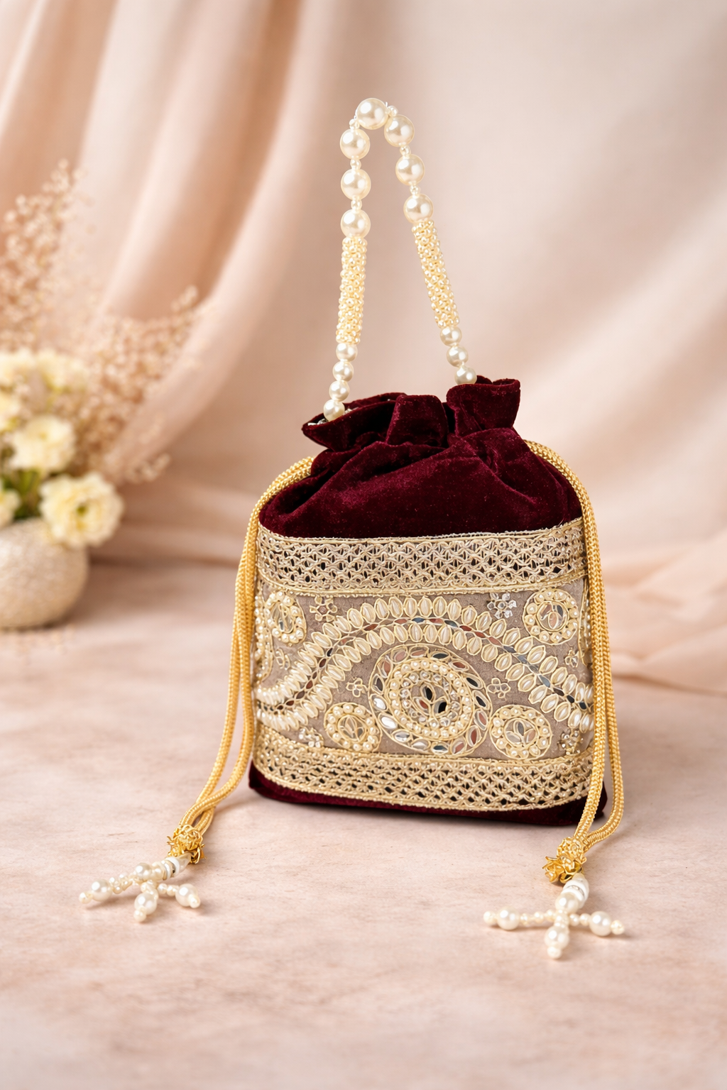 Royal Maroon Velvet Potli Bag with Pearl Handle & Gold Embroidery